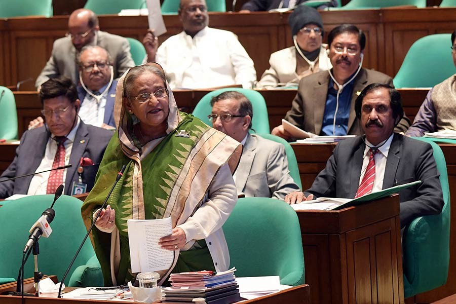 Prime Minister Sheikh Hasina replying to a question from a lawmaker during the PM’s question-answer session at the parliament on Wednesday. -PID Photo