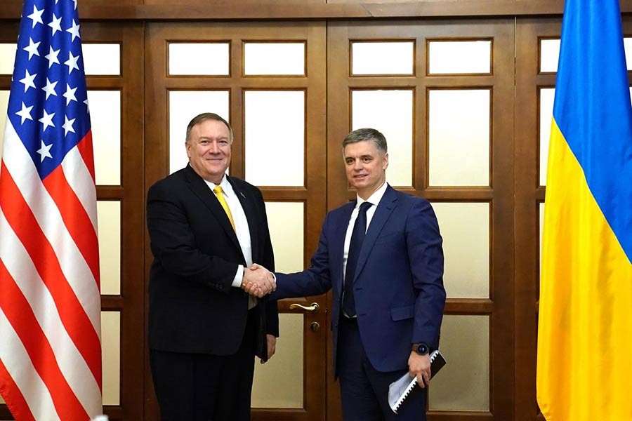 US Secretary of State Mike Pompeo shaking hands with Ukraine's President Volodymyr Zelensky at a meeting in Kiev, Ukraine, on Friday. -Reuters Photo