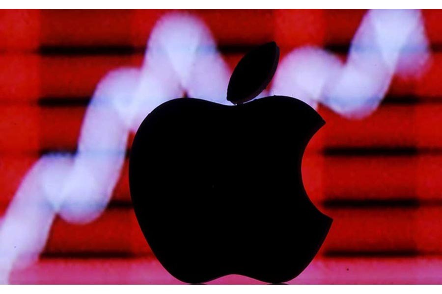 A 3D printed Apple logo is seen in front of a displayed stock graph in this illustration taken Feb 26, 2016. REUTERS