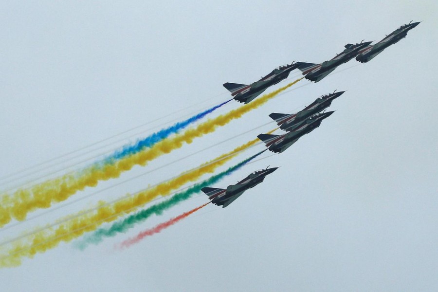 China's People's Liberation Army Air Force (PLAAF) Ba Yi aerobatics team perform an aerial display during a media preview of the Singapore Airshow in Singapore February 9, 2020. REUTERS/Edgar Su