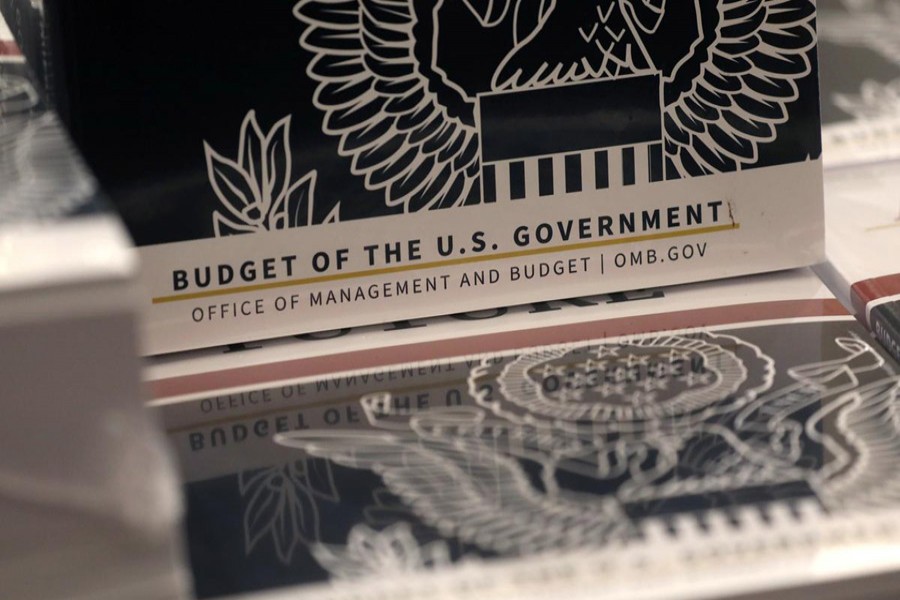 Copies of US president Donald Trump's FY2021 budget proposal sit on display for the news media on Capitol Hill in Washington, US, February 10, 2020. Reuters