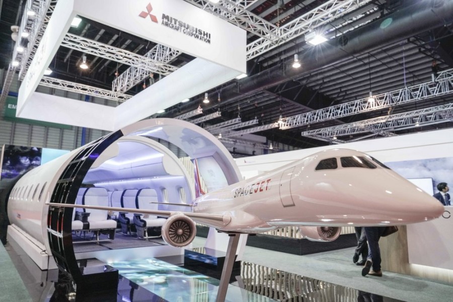 A static model of a Mitsubishi Aircraft Spacejet sits on display at the Singapore Airshow on Tuesday, Feb. 11, 2020, in Singapore. (AP Photo/Danial Hakim)