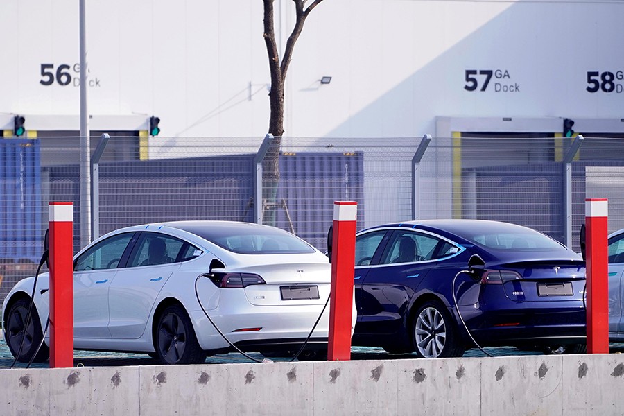 China-made Tesla Model 3 electric vehicles are seen at the Gigafactory of electric car maker Tesla in Shanghai, China on December 2, 2019 — Reuters/Files