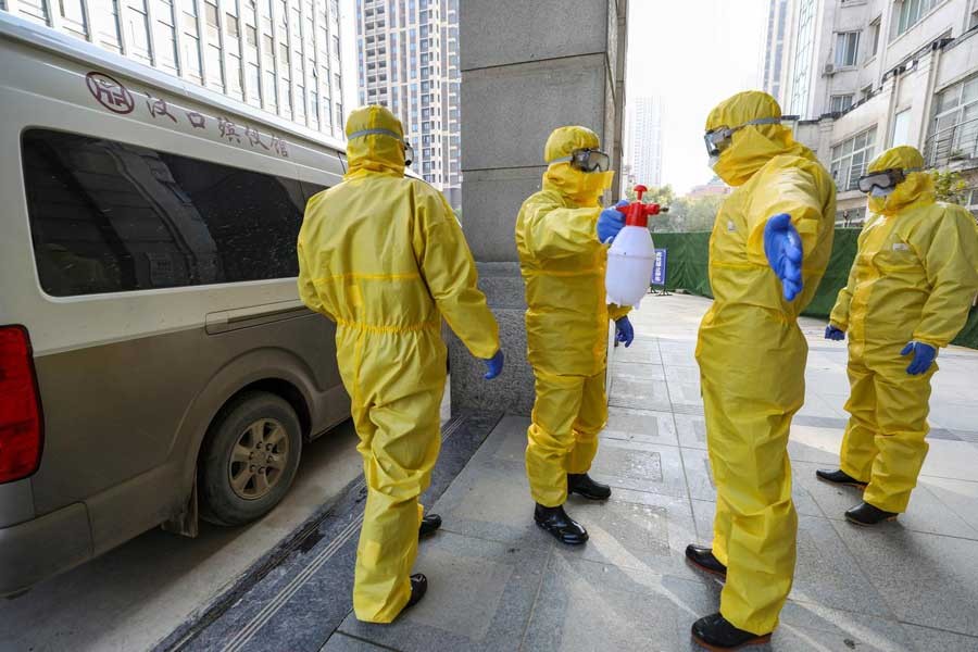 China says coronavirus curbs start to work