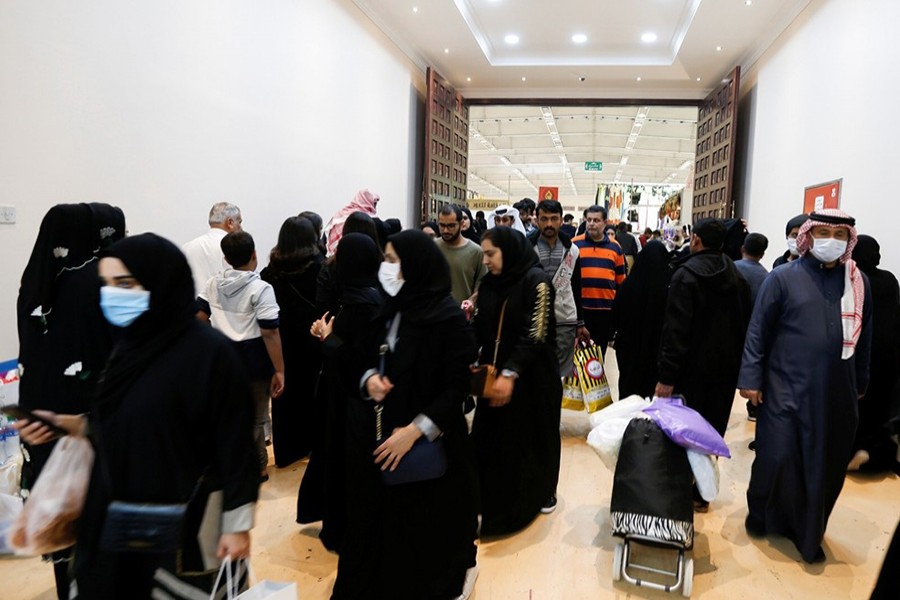 Locals wear face masks to take precautions from coronavirus, as they shop at the Bahrain's Autumn Fair 2020, in Manama — Reuters/Files