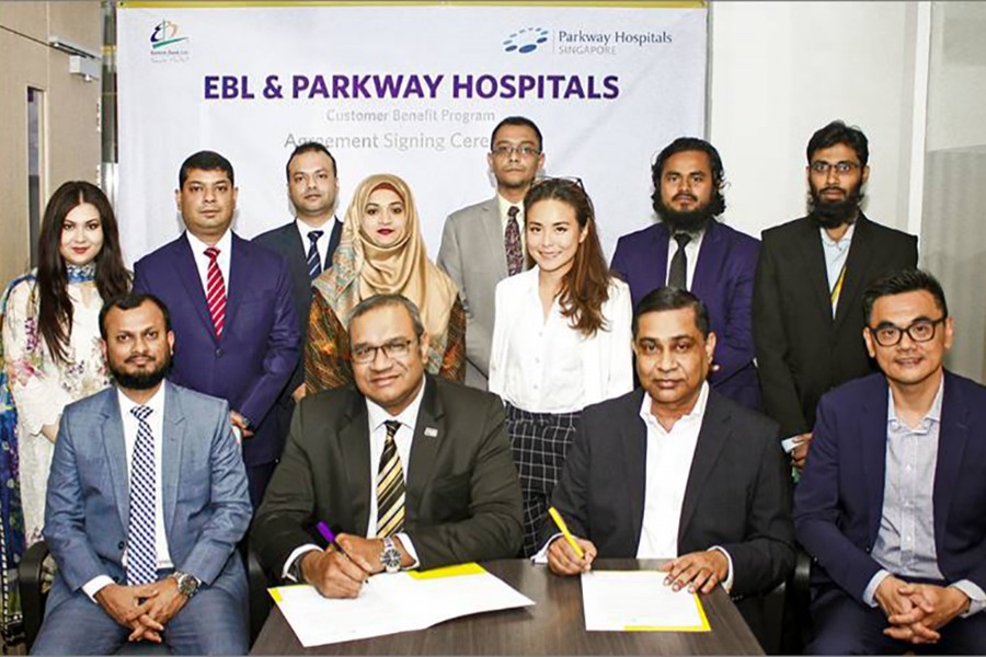 M Khorshed Anowar (sitting second from left), head of retail and SME banking of Eastern Bank Limited (EBL) and Zahid Hassan Khan (sitting second from right), director, Parkway Hospitals Bangladesh Office, seen signing an agreement