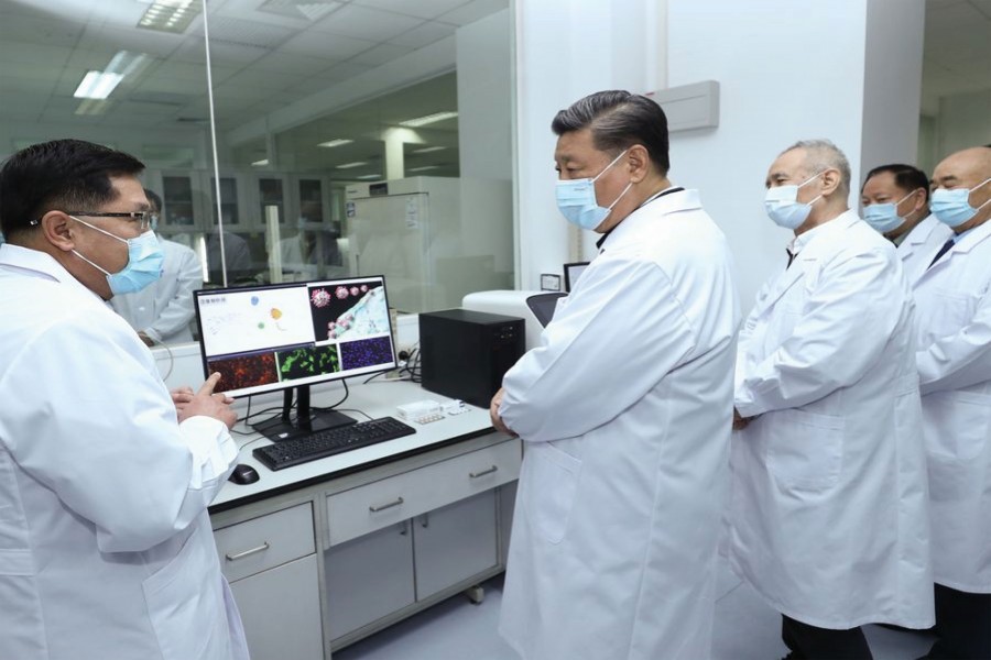 Chinese President Xi Jinping, also general secretary of the Communist Party of China Central Committee and chairman of the Central Military Commission, learns about the progress on the COVID-19 vaccine and anti-body during his visit to the Academy of Military Medical Sciences in Beijing, March 02, 2020.     — Photo: Xinhua