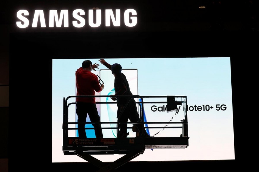 Workers set up a Samsung display in the lobby of the Las Vegas Convention Center in preparation for the 2020 CES in Las Vegas, Nevada, US on January 5, 2020 — Reuters photo