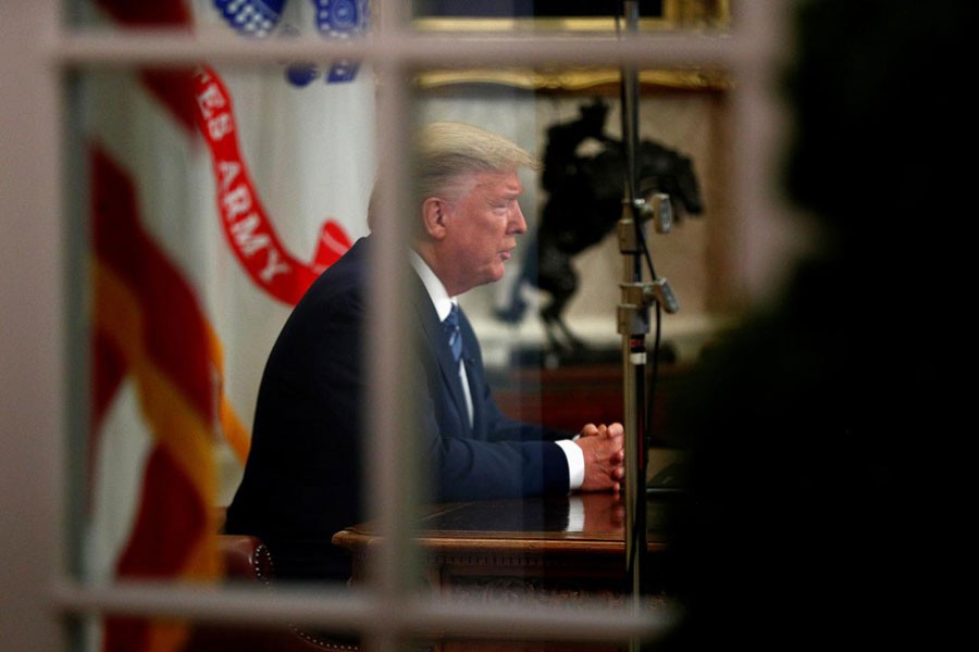 US President Donald Trump addresses the nation during a live television broadcast regarding the COVID-19 coronavirus pandemic, from inside the Oval Office at the White House in Washington, U.S., March 11, 2020: All global investors got from US President Donald Trump's coronavirus package were a shock travel ban on Europe and a flashing signal to sell, and none of the large-scale tax breaks or medical tests for Americans they'd been expecting. The deep disappointment with Trump's much-touted plan, which he unveiled late on Wednesday, spurred massive falls in global stock markets. US stock index futures ESc1 plunged nearly 5.0 per cent, almost hitting their circuit breakers for the second time in a week           —Reuters   