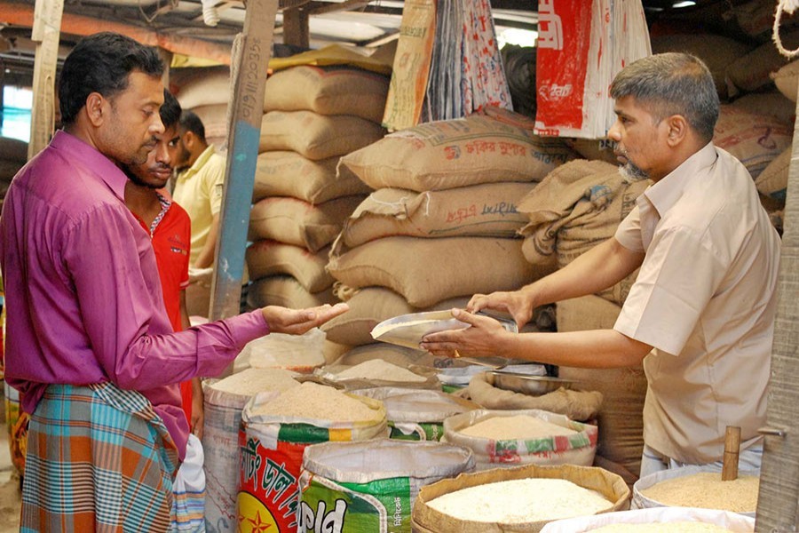 Prices of some essentials, including rice, increase on Wednesday due to 'panic buying' amid virus fears. — Focus Bangla/Files