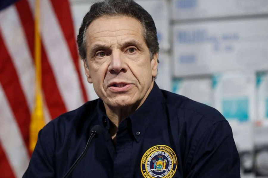 New York Gov. Andrew Cuomo speaks during a news conference against a backdrop of medical supplies at the Jacob Javits Center that will house a temporary hospital in response to the COVID-19 outbreak, March 24, 2020, in New York. John Minchillo/AP