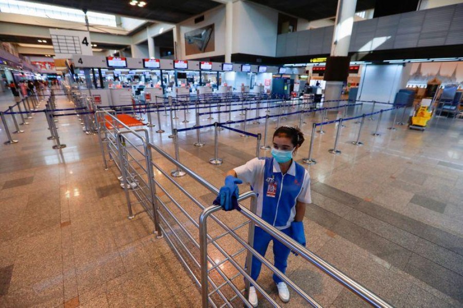 World News March 11, 2020 / 1:23 PM / 14 days ago Thailand restricts visitor visas to limit virus spread  3 Min Read  BANGKOK (Reuters) - Thailand will temporarily suspend issuing visas on arrival to visitors from 19 countries and territories, including China, to contain the spread of the coronavirus, its interior minister said on Wednesday. A worker cleans near check-in counters for international flights are seen empty due to the coronavirus outbreak at Don Mueang Airport in Bangkok, Thailand March 11, 2020. REUTERS/Soe Zeya Tun