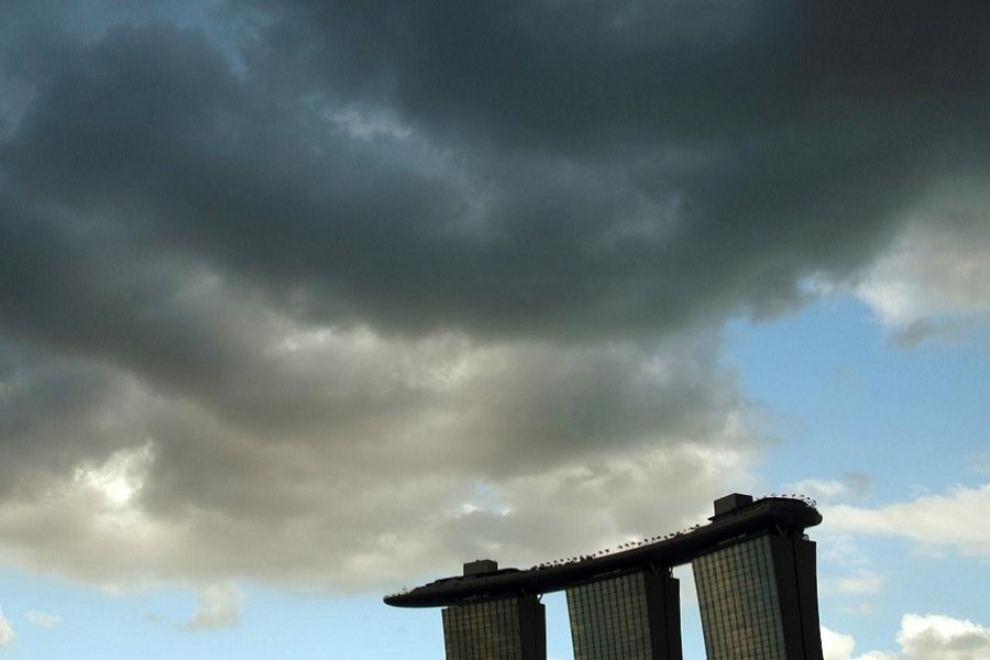 Clouds are seen above the Marina Bay Sands resort in Singapore, January 24, 2011. — Reuters/Files
