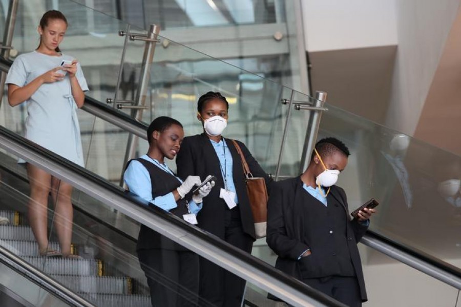 Top News March 23, 2020 / 6:16 PM / 4 days ago South Africa's confirmed coronavirus cases jump by 128 to 402  1 Min Read  Airport staff wear protective masks at Cape Town International Airport, amid the coronavirus outbreak, in Cape Town, South Africa, March 18, 2020. REUTERS/Sumaya Hisham
