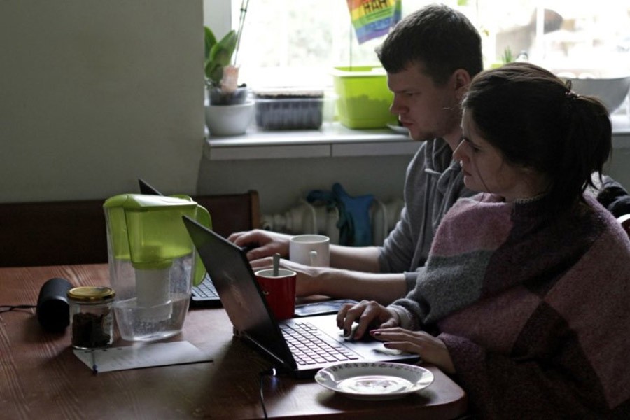Two people working from home during the outbreak of coronavirus disease, in Gdynia, Poland, on March 16 –Reuters Photo