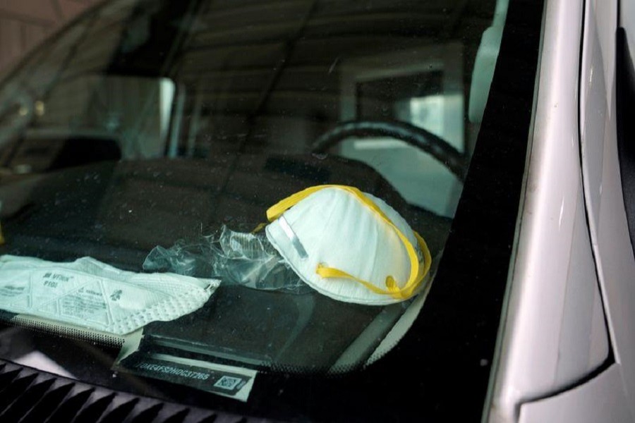 A protective face mask is seen on the dashboard of a REACT EMS ambulance in Shawnee, Oklahoma, US, amid a coronavirus disease (COVID-19) outbreak, April 02, 2020. — Reuters