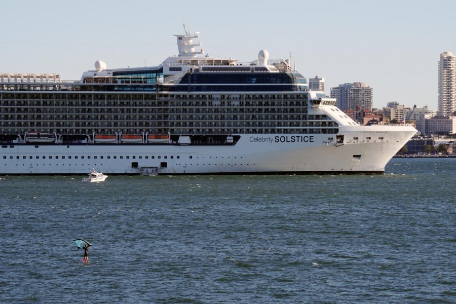 The Celebrity Solstice cruise ship is moored in Sydney Harbour, as a large maritime operation is underway to restock several cruise ships which have been ordered out of Australian waters due to coronavirus disease (COVID-19) outbreak, in Sydney, Australia April 4, 2020. REUTERS/Stephen Coates