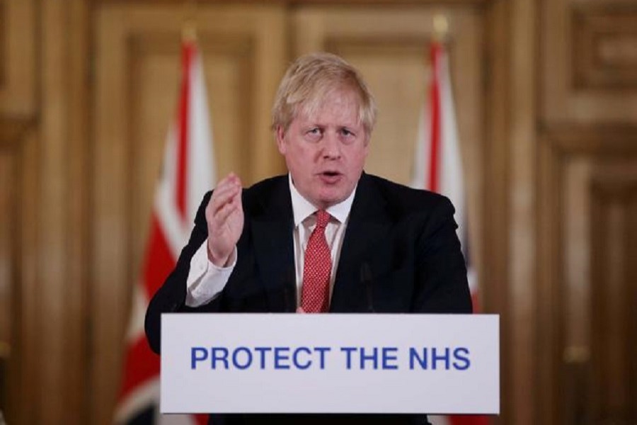 Britain's Prime Minister Boris Johnson looks out from an ambulance during a visit to Pilgrim Hospital in Boston, Britain, August 05, 2019. — Darren Staples/Pool via Reuters