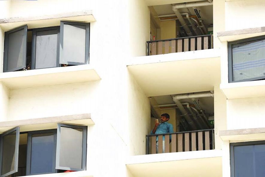 Singapore battles virus hotspots in migrant workers' dorms