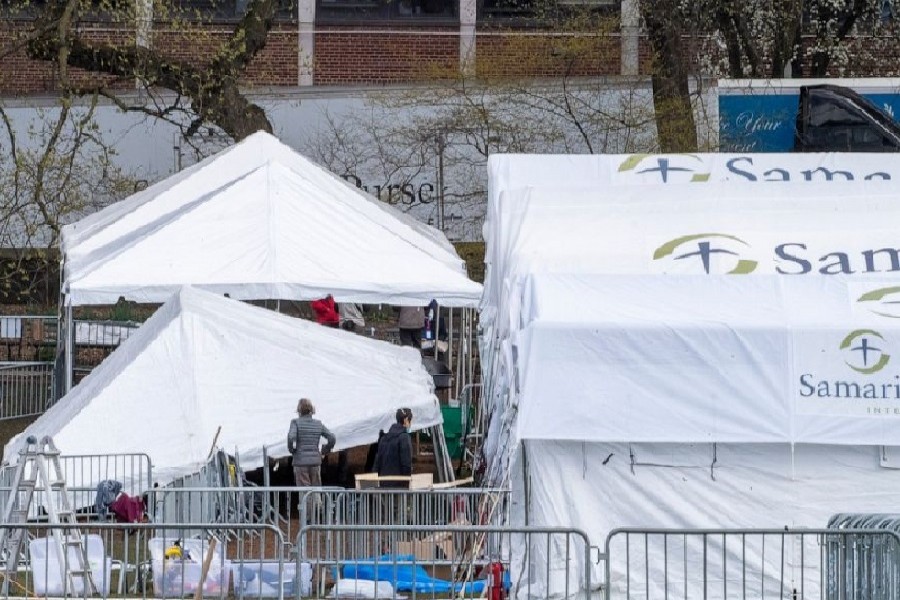 In this March 31, 2020 photo, a Samaritan's Purse crew erects privacy tents at a 68-bed emergency field hospital specially equipped with a respiratory unit in New York's Central Park, in New York. – AP Photo