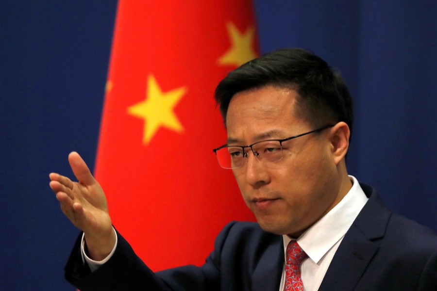 Chinese Foreign Ministry spokesman Zhao Lijian attends a news conference in Beijing, China on April 8, 2020 — Reuters/Files