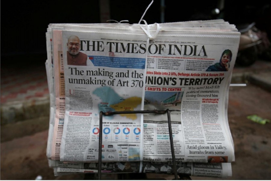 India's newspapers slash jobs, salaries
