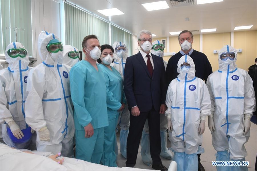 Mayor of Moscow Sergei Sobyanin (C) attends the opening of a new infectious disease hospital for COVID-19 patients in the village of Voronovskoye, outside Moscow, Russia, on April 17, 2020. Russia has registered a daily record of 4,070 COVID-19 cases over the last 24 hours, with the total number reaching 32,008 as of Friday, official data showed. (Sputnik via Xinhua)