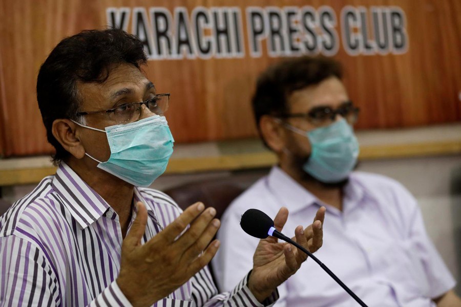 Dr Qaiser Sajjad, secretary-general of the Pakistan Medical Association (PMA) along with other doctors speaks during a news conference to appeal government and religious scholars for a strict implementation of the lockdown to prevent congregations in Ramadan, to stem the spread of the coronavirus disease (COVID-19), in Karachi, Pakistan on April 22, 2020 — Reuters photo