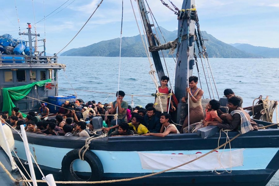 A boat carrying suspected ethnic Rohingya migrants is seen detained in Malaysian territorial waters, in Langkawi, Malaysia April 5, 2020. Malaysian Maritime Enforcement Agency/Handout via REUTERS