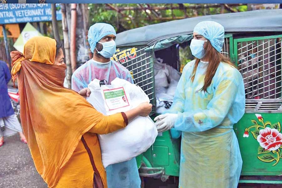 Nafisa Anjum Khan, founder of 'Ekjon Bangladesh',  assisting helpless people