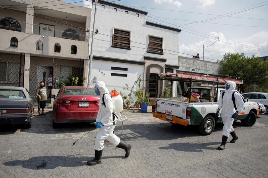 Municipal workers sanitise the surroundings of the nursing house "Retirement House Luis Elizondo", where people have been infected by the coronavirus disease (COVID-19), in Guadalupe, on the outskirts of Monterrey, Mexico May on 6, 2020 — Reuters photo