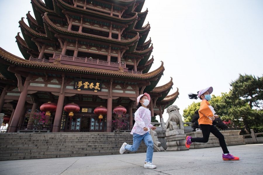 Tourists visit the Yellow Crane Tower, or Huanghelou, a landmark in Wuhan, central China's Hubei Province, April 29, 2020. (Xinhua/Xiao Yijiu)