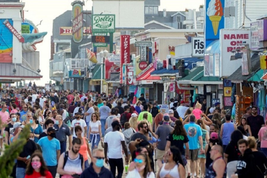 With the relaxing of the coronavirus disease (COVID-19) restrictions, visitors crowd the boardwalk on Memorial Day weekend in Ocean City, Maryland, US, May 23, 2020. — Reuters/Files