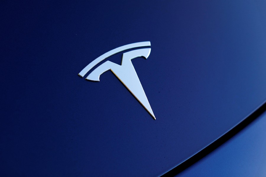 The front hood logo on a 2018 Tesla Model 3 electric vehicle is shown in this photo illustration taken in Cardiff, California, US on June 1, 2018 — Reuters/Files