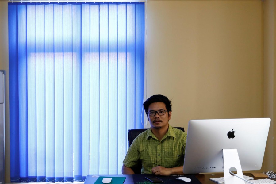 Nepal's climbing guide Tashi Lakpa Sherpa poses for a picture at his home during the lockdown imposed by the government amid concerns about the spread of the coronavirus disease (COVID-19), in Kathmandu, Nepal May 25, 2020. REUTERS/Navesh Chitrakar