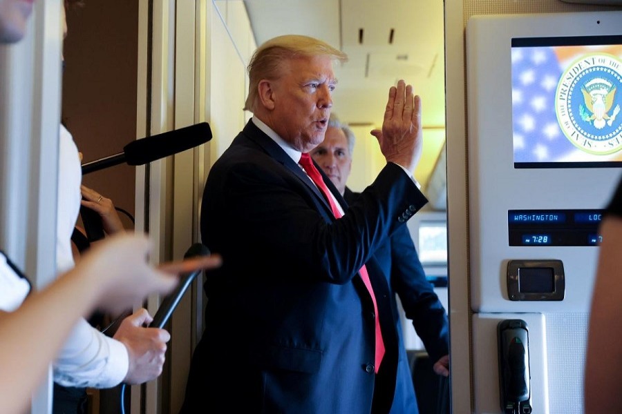 US President Donald Trump speaks to reporters aboard Air Force One while returning to Washington from Cape Canaveral, Florida, US, May 30, 2020. — Reuters