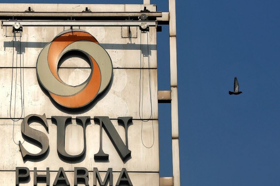 A bird flies past the logo of Sun Pharma installed on the facade of its corporate office in Mumbai, India, November 14, 2017. REUTERS/Shailesh Andrade/File Photo