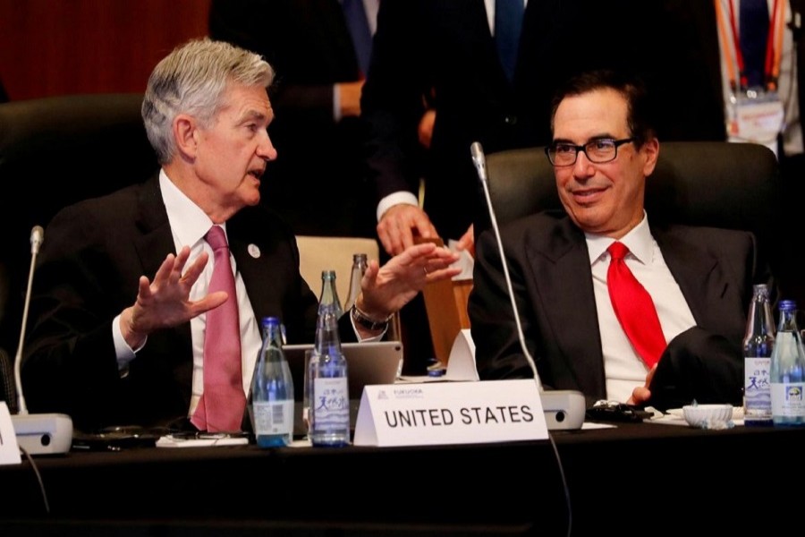 Federal Reserve Chair Jerome Powell talks with US Treasury Secretary Steven Mnuchin during the G20 finance ministers and central bank governors meeting in Fukuoka, Japan June 08, 2019. — Reuters/Files