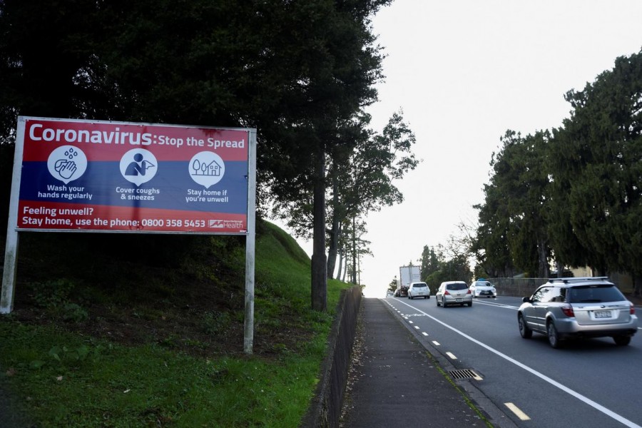 Morning traffic passes a warning sign on the first day of all New Zealand domestic regulations being lifted for the coronavirus disease (COVID-19) in Nelson, New Zealand on June 9, 2020 — Reuters/Files