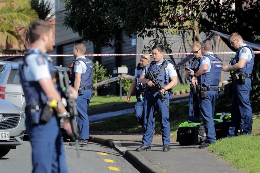 Armed police gather at the scene of a shooting incident following a routine traffic stop in Auckland, New Zealand on Friday, June 19, 2020 — AP photo