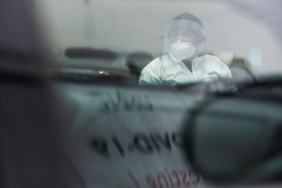 A medical worker coordinates testing as dozens of people wait in their cars at United Memorial Medical Center amid the global outbreak of the coronavirus disease (Covid-19), in Houston, Texas on US, on June 23, 2020 — Reuters photo