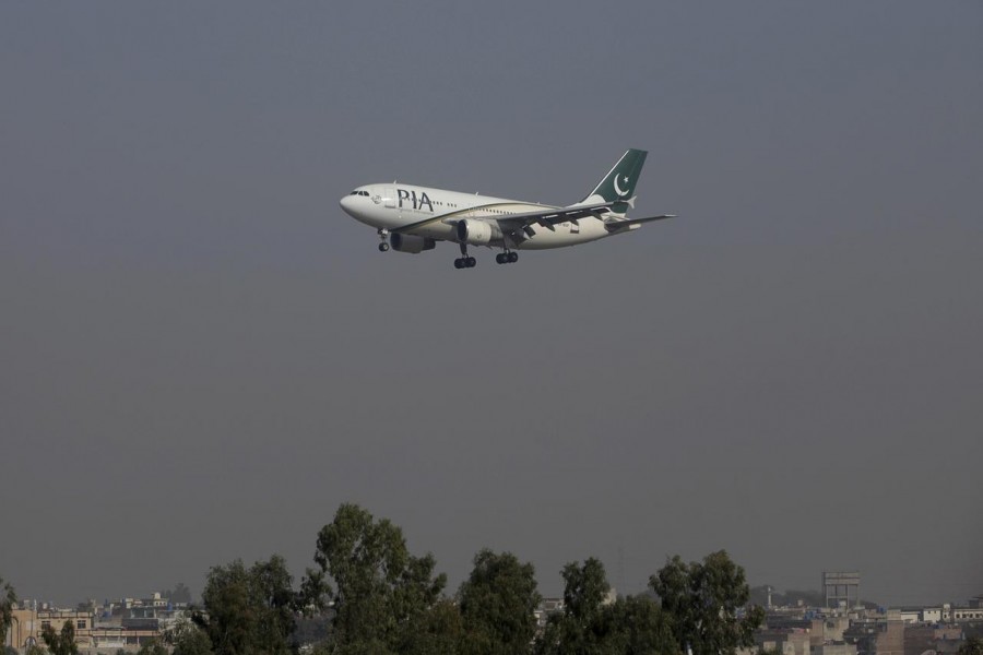 A Pakistan International Airlines (PIA) passenger plane arrives at the Benazir International airport in Islamabad, Pakistan, December 2, 2015. REUTERS/Faisal Mahmood/Files
