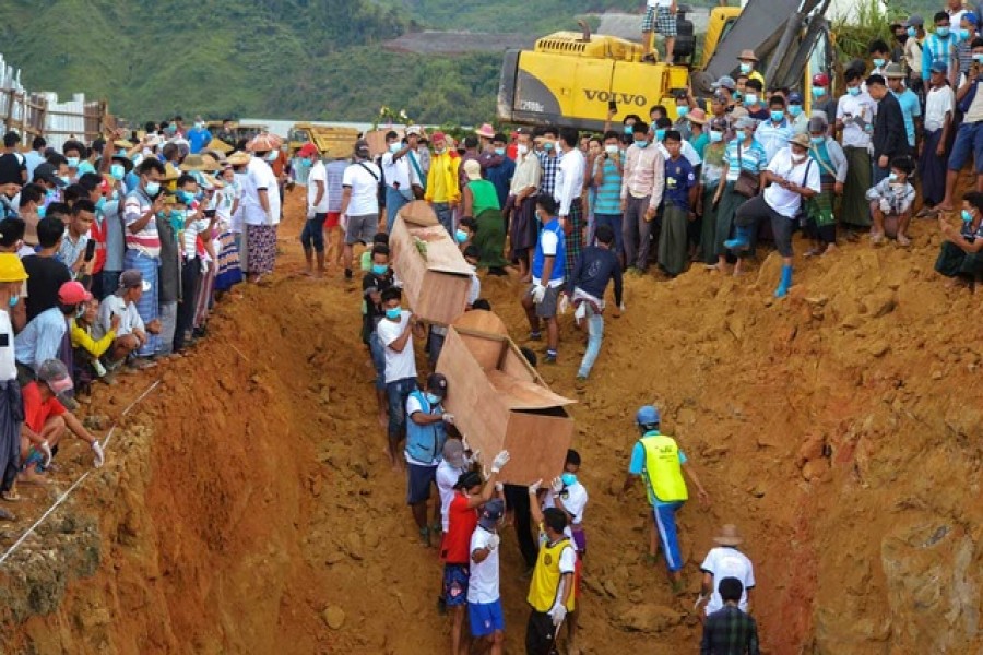Dozens more jade miners killed in a landslide in northern Myanmar will be buried on Saturday, a local official said, after 77 others were interred in a mass grave on Friday following one of the worst mining accidents in the country’s history, reports Reuters.  More than 170 people, many of them migrants seeking their fortune in the jade-rich Hpakant area of Kachin state, died on Thursday after mining waste collapsed into a lake, triggering a surge of mud and water. The miners were collecting stones in Hpakant - the centre of Myanmar’s secretive billion-dollar jade industry - when the wave crashed onto them, entombing them under a layer of mud. Thar Lin Maung, a local official from the information ministry, told Reuters by phone on Saturday 171 bodies had been pulled out but more were continuing to float to the surface. He said the 77 buried on Friday had been identified and 39 would be interred on Saturday. Volunteers carried plywood coffins and placed them into a mass grave carved out by diggers close to the mine site. Many other bodies, battered and stripped of their clothing by the force of the wave that hit them, still have not been identified. Myanmar supplies 90 per cent of the world’s jade, the vast majority of which is exported to neighbouring China, which borders Kachin state. Deadly landslides and other accidents are common in the mines, which draw impoverished workers from across Myanmar. About 100 people were killed in a 2015 collapse that led to calls to regulate the industry. Another 50 died in 2019. But Thursday's landslide was the worst in memory. The country’s leader, Aung San Suu Kyi, on Friday blamed the disaster on joblessness in the country, lamenting in a Facebook Live broadcast that informal workers had to go to the mines for lack of other employment. The government announced the formation of a committee to investigate the disaster. However, activists say little has changed in the industry despite a pledge from Suu Kyi's government to clean it up when she took power in 2016. Rights group Global Witness said in a statement the landslide was a “damning indictment of the government’s failure to curb reckless and irresponsible mining practices.” “Neither a promised new Gemstone law, passed by parliament in 2019, nor a Gemstone policy that has been in production for several years have yet been implemented,” the statement said. The rights group says the trade is worth billions of dollars a year, funds it says fuel armed conflict between government troops and ethnic Kachin rebels fighting for greater autonomy for the region.