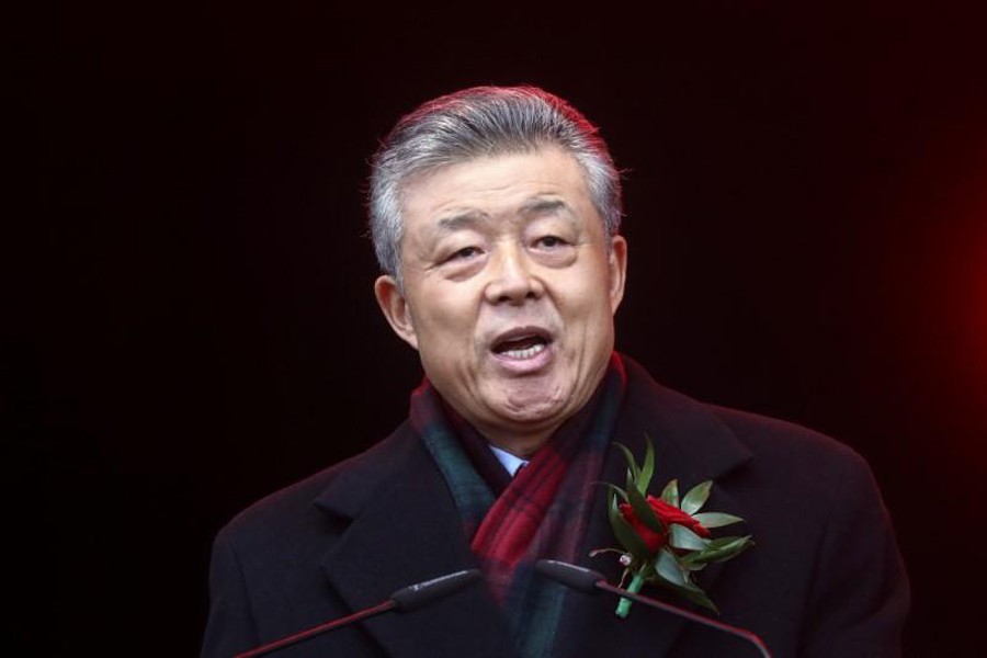 FILE PHOTO: Chinese Ambassador to Britain Liu Xiaoming talks to the crowd following the Chinese Lunar New Year parade through central London, Britain January 26, 2020. REUTERS/Simon Dawson