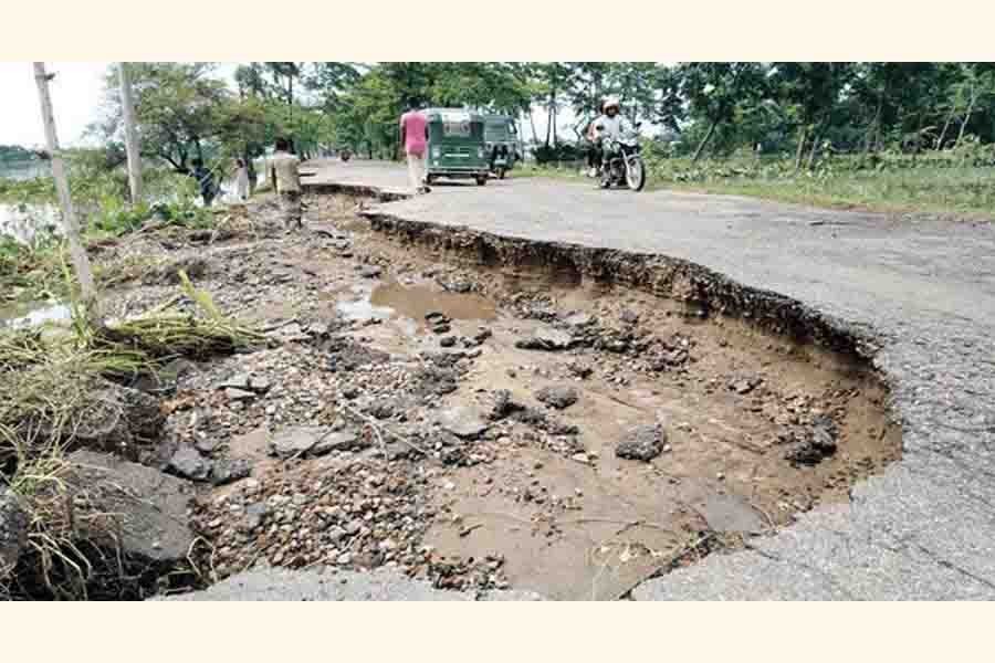 The Sunamganj-Biswambharpur road was washed away at places by the last week's floods — FE Photo