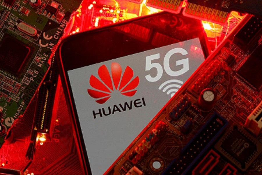 A smartphone with the Huawei and 5G network logo is seen on a PC motherboard in this illustration picture taken January 29, 2020 — Reuters/Files
