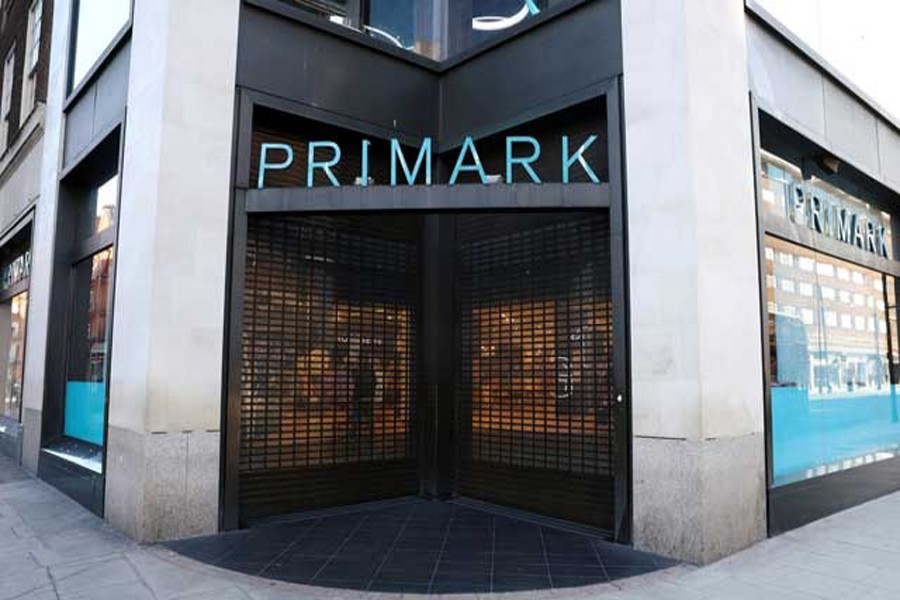 The shutters are closed to the entrance of a Primark store on Oxford Street because of the coronavirus disease outbreak in London. REUTERS