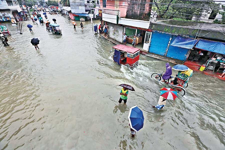 A flooded road in Sunamganj town on the banks of the Surma River on Sunday — bdnews24.com