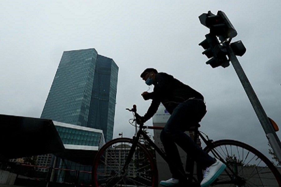 A man cycles towards the European Central Bank (ECB) headquarters in Frankfurt, Germany, July 08, 2020 — Reuters/Files