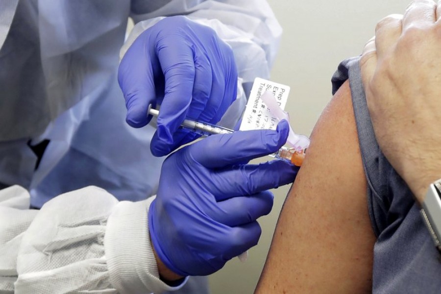 In this March 16, 2020, file photo, Neal Browning receives a shot in the first-stage safety study clinical trial of a potential vaccine for Covid-19, the disease caused by the new coronavirus, at the Kaiser Permanente Washington Health Research Institute in Seattle, US — AP/Files